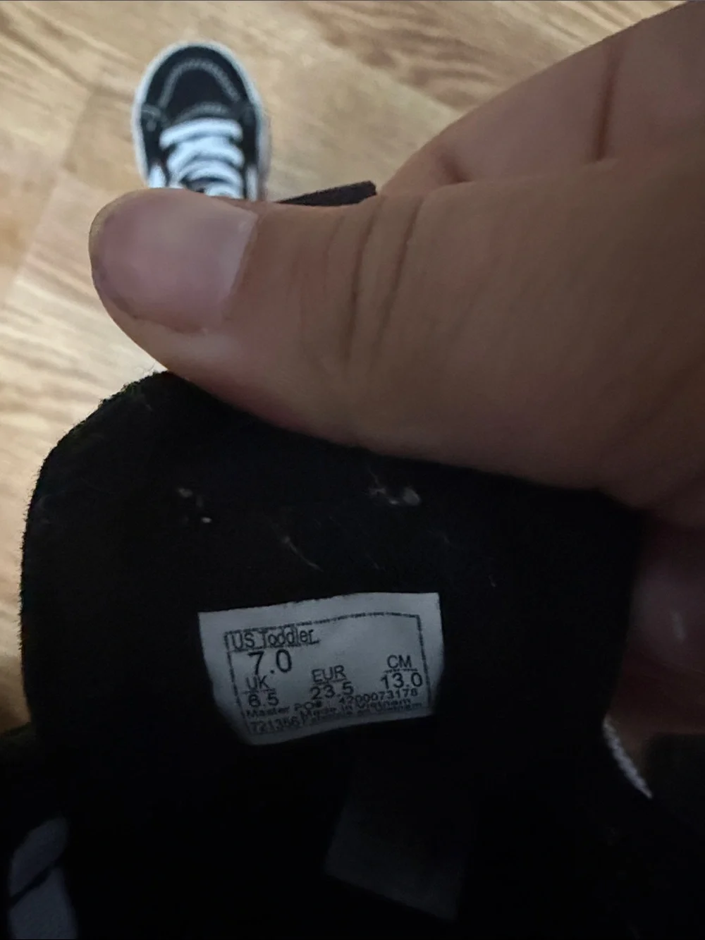 Vans Kids Black and White High-Top Sneakers